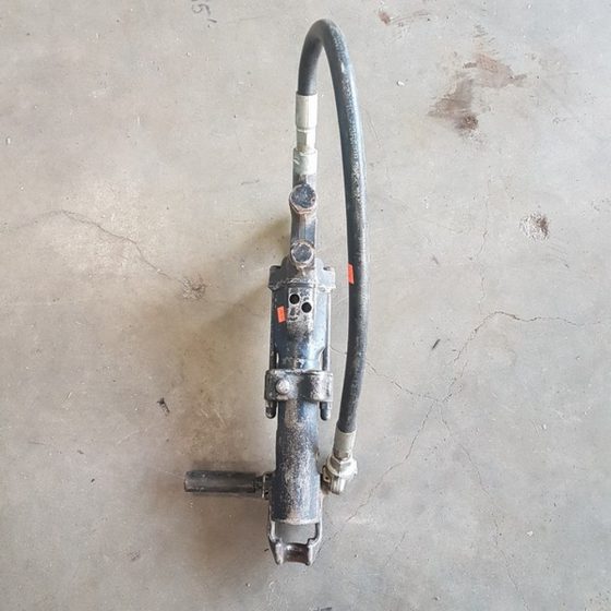 Atlas Copco Black BBD12D jack hammer with hose Coast Machinery Group