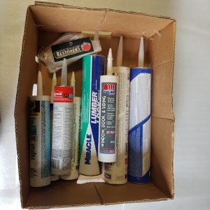 Box of Misc Caulking Supplies