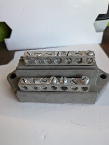 Used G.E. Neutral/Ground Lug Bar Connection Block