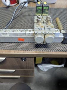 Used Bosch 0-820-022-138 (2) Pneumatic Valve Manifolds With Solenoids And 8 Port Bar Manifold